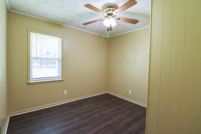 spare room featuring hardwood / wood-style flooring, ornamental molding, and ceiling fan