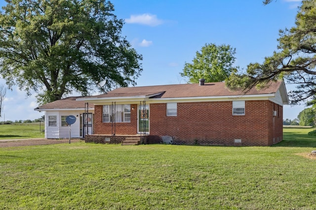 single story home featuring a front yard