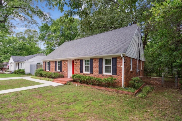 view of front of home with a front lawn