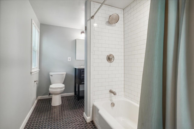 full bathroom with tile floors, toilet, shower / bathtub combination with curtain, and vanity