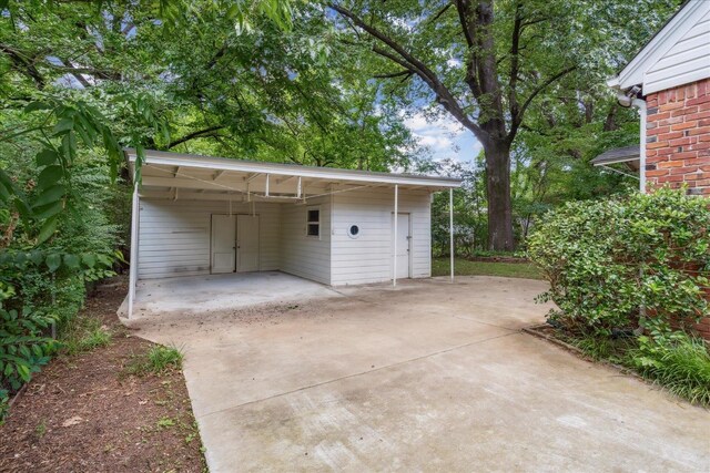 garage with a carport