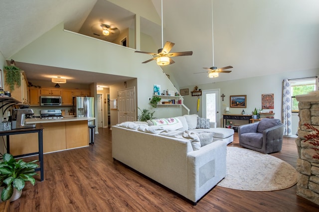 living room with high vaulted ceiling, dark wood-type flooring, and ceiling fan