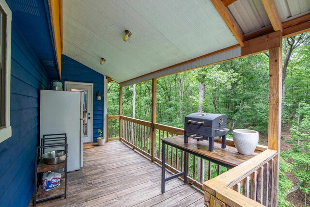 wooden terrace with grilling area