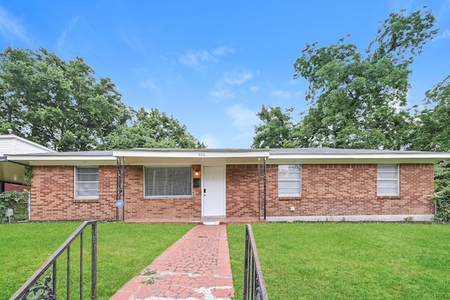 ranch-style house with a front yard