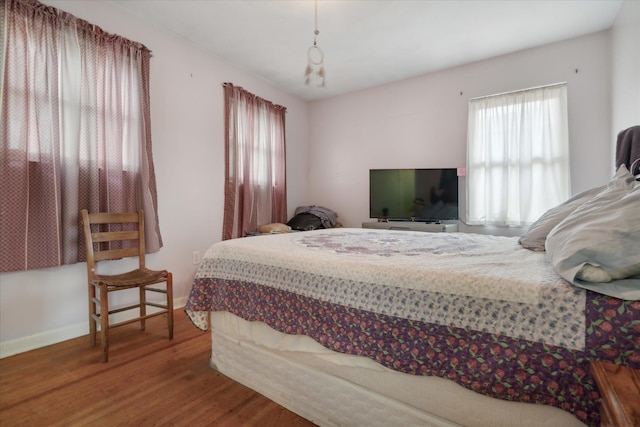 bedroom featuring hardwood / wood-style floors