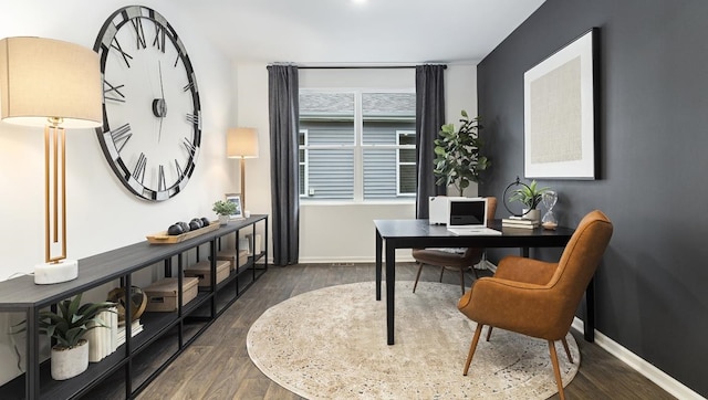 office with dark hardwood / wood-style floors