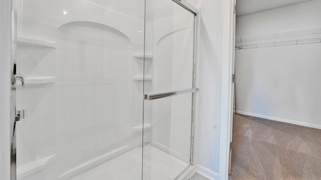 525 Azalea Dr, Somerville, TN 38068 - full bath featuring a stall shower, baseboards, and a spacious closet