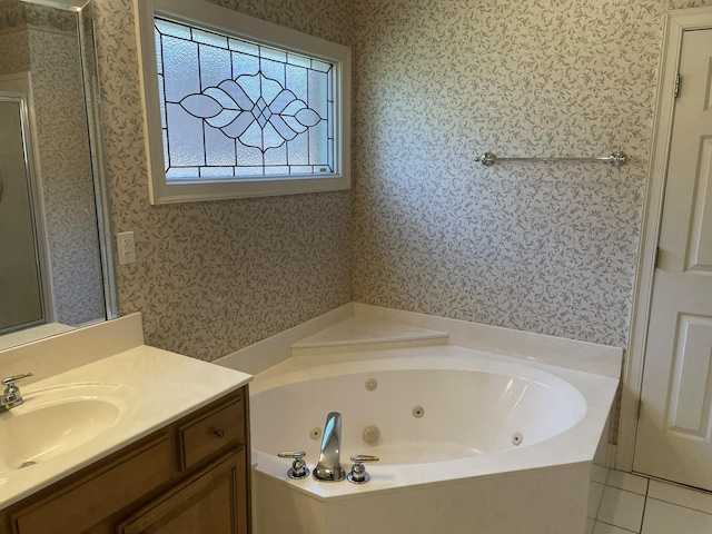 bathroom featuring vanity, tile patterned floors, and separate shower and tub