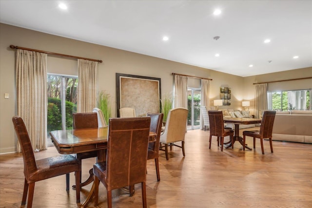 dining area with light hardwood / wood-style floors