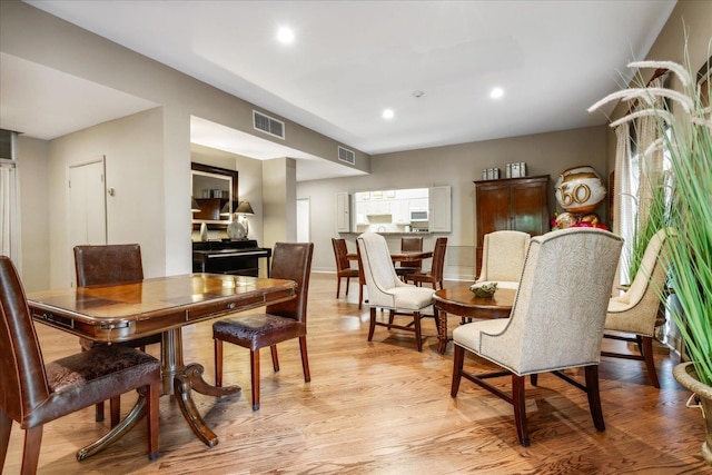 dining area featuring light hardwood / wood-style floors