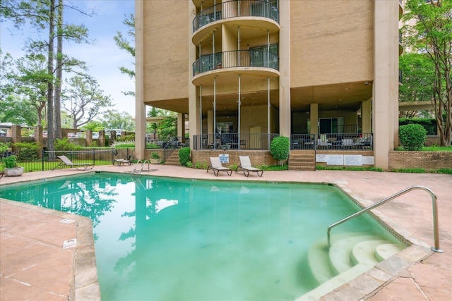 view of pool with a patio