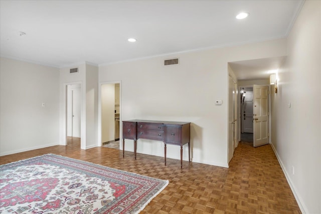 interior space featuring parquet floors and ornamental molding