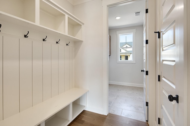 mudroom featuring dark wood-type flooring