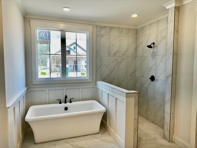 bathroom featuring crown molding and shower with separate bathtub