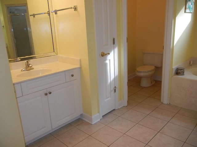 full bathroom with tile patterned flooring, vanity, toilet, and independent shower and bath