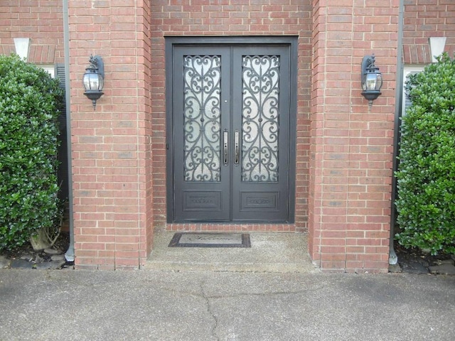 doorway to property featuring french doors