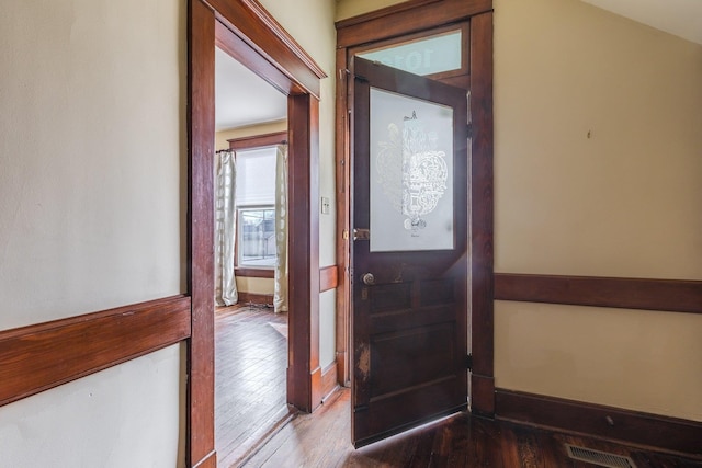 doorway featuring hardwood / wood-style floors