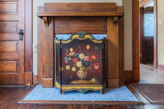 details with hardwood / wood-style flooring