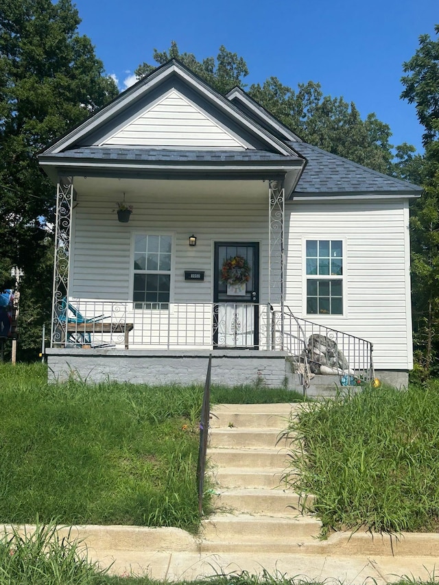 bungalow-style house featuring covered porch