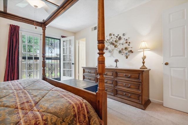 bedroom with light colored carpet and ceiling fan