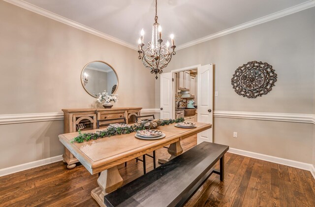 dining space with baseboards, dark wood-style flooring, and crown molding