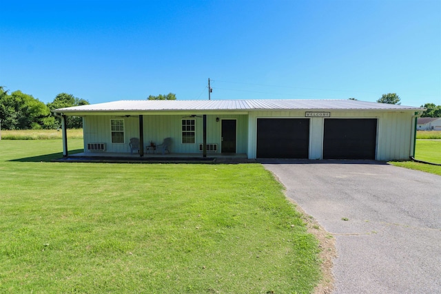 ranch-style home with a front yard and a porch