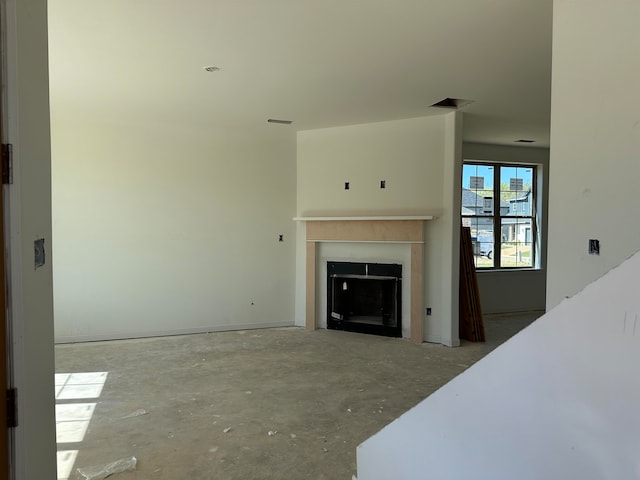 living room featuring concrete floors