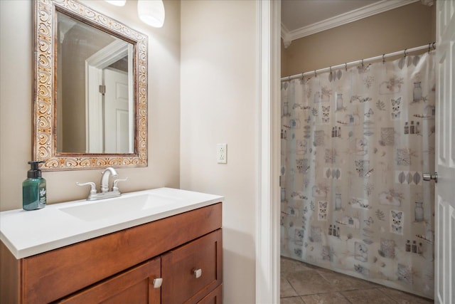 bathroom with a shower with curtain, vanity, ornamental molding, and tile patterned flooring