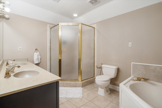 full bathroom with tile patterned floors, toilet, vanity, and shower with separate bathtub