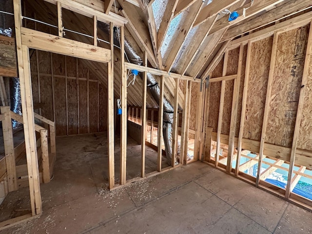 miscellaneous room featuring vaulted ceiling