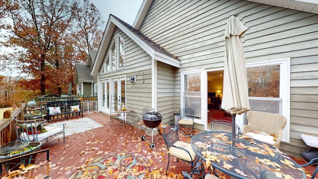 view of patio with french doors and a deck