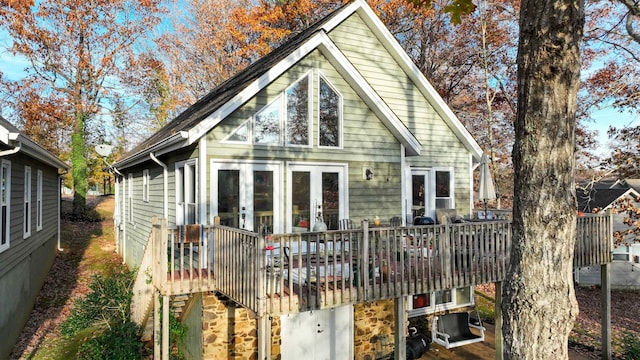 rear view of property with french doors