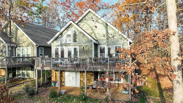 rear view of house with a deck