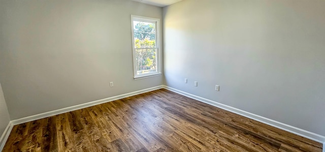 empty room featuring hardwood / wood-style flooring and plenty of natural light