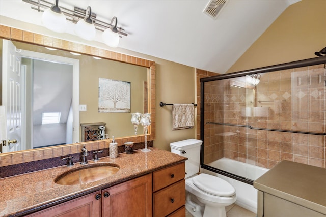 full bathroom featuring vanity, bath / shower combo with glass door, lofted ceiling, and toilet