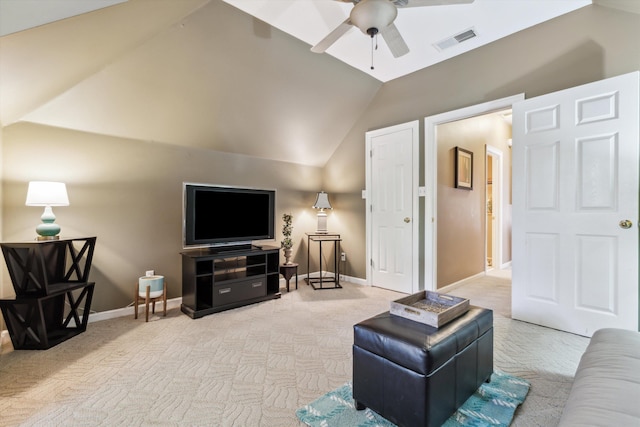 carpeted living room with vaulted ceiling and ceiling fan