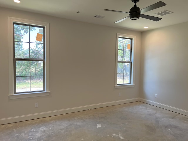 unfurnished room with ceiling fan