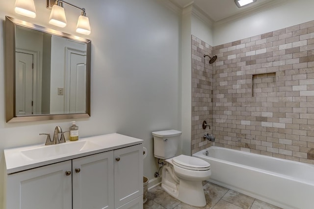 full bathroom featuring tile patterned floors, crown molding, toilet, vanity, and tiled shower / bath