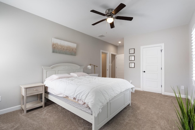 carpeted bedroom featuring ceiling fan