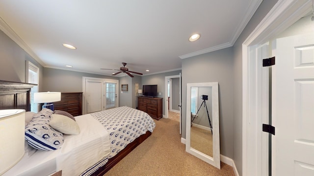 bedroom featuring ceiling fan, carpet floors, and crown molding