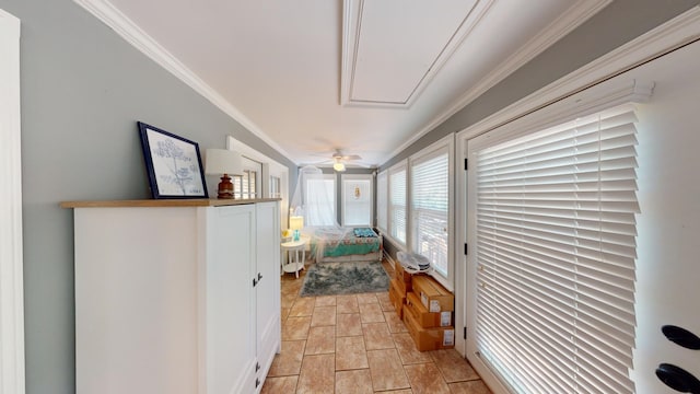 interior space with attic access and ornamental molding