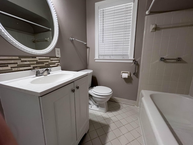 full bathroom featuring vanity, backsplash, tile patterned floors, tiled shower / bath combo, and toilet