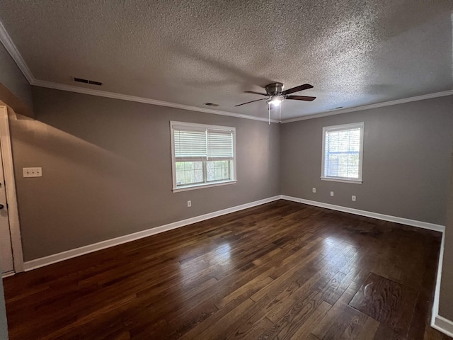 spare room featuring a textured ceiling, ceiling fan, dark hardwood / wood-style floors, and ornamental molding