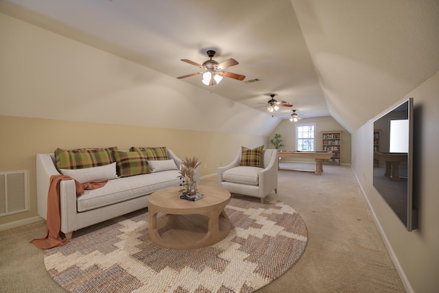 carpeted living room with ceiling fan, vaulted ceiling, and pool table