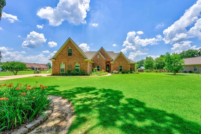 view of front of home featuring a front lawn