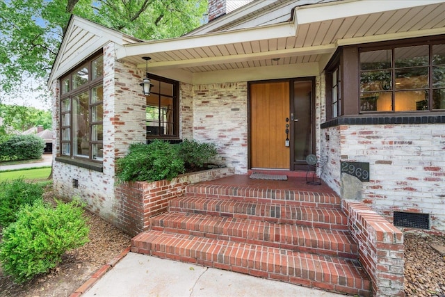 entrance to property with covered porch