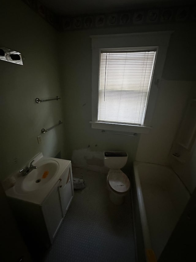 full bathroom featuring shower / tub combination, vanity, and toilet