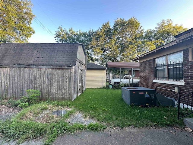 view of yard featuring central AC unit