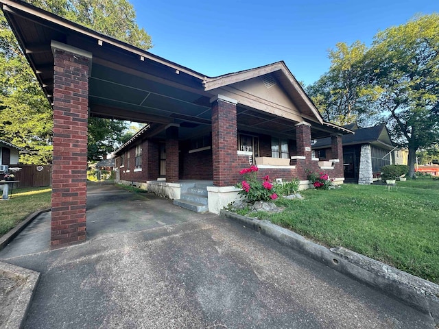 view of home's exterior with a yard