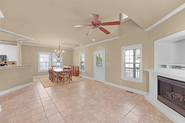 dining room with light tile patterned flooring and ornamental molding